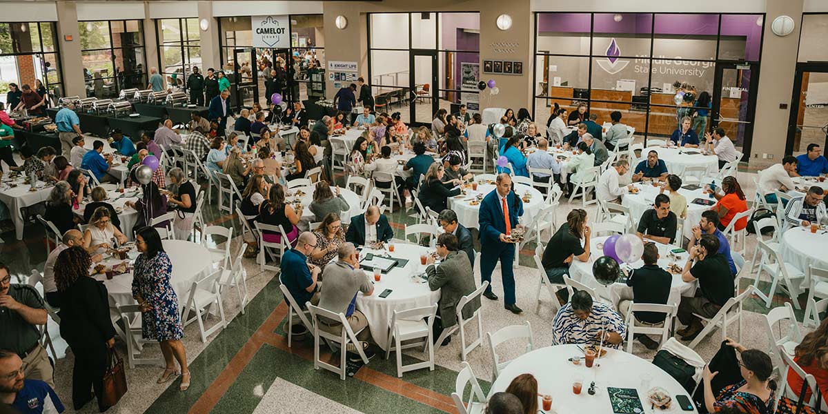 Overhead shot of a bustling event at MGA's Macon Campus Student Life Center.